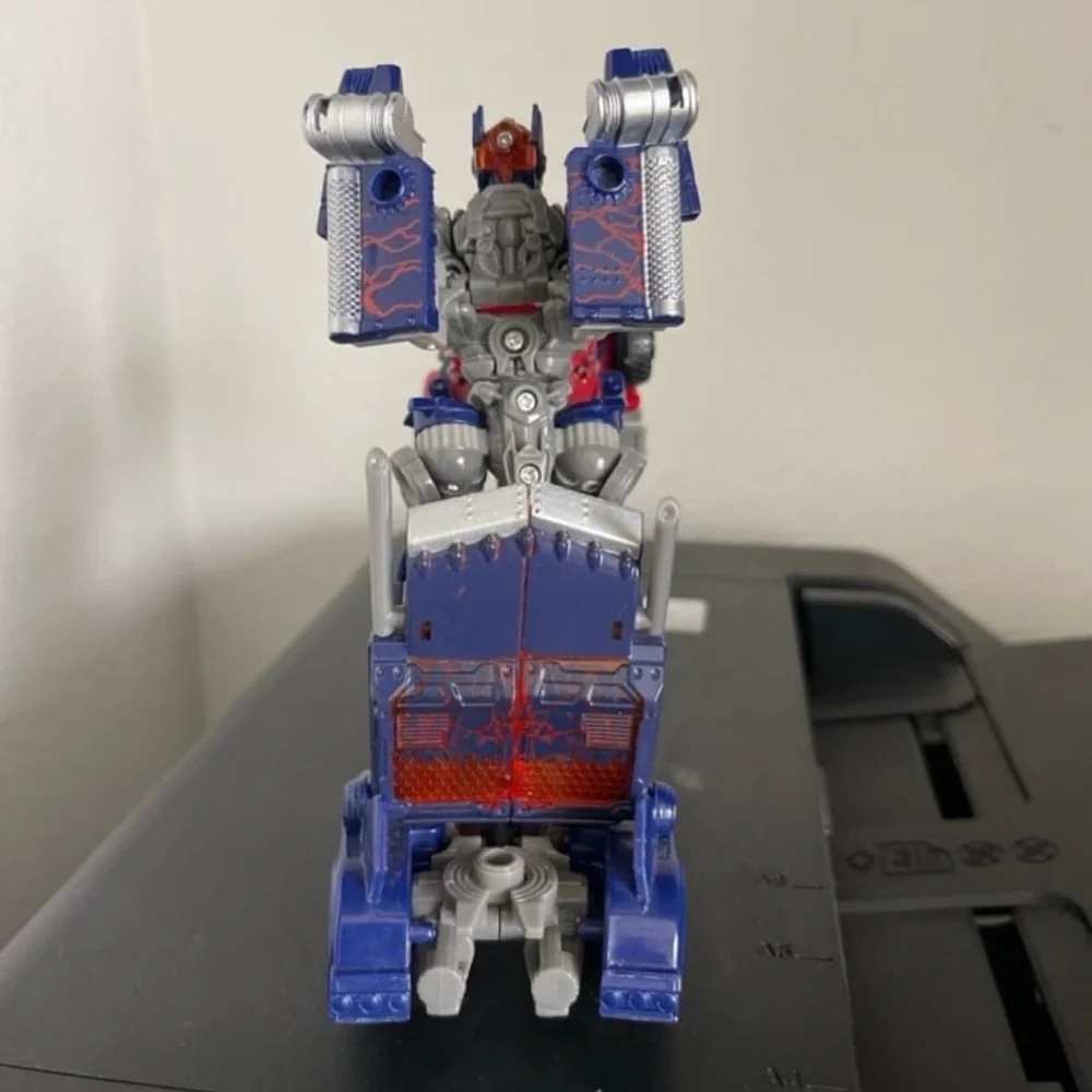 Hasbro Transforming Robot - Red, Blue, and Silver